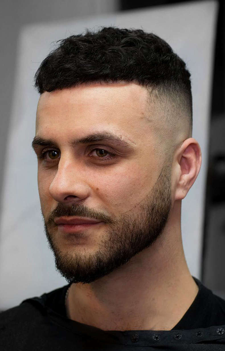is a military-inspired buzz cut with the hair on top trimmed to a very short length